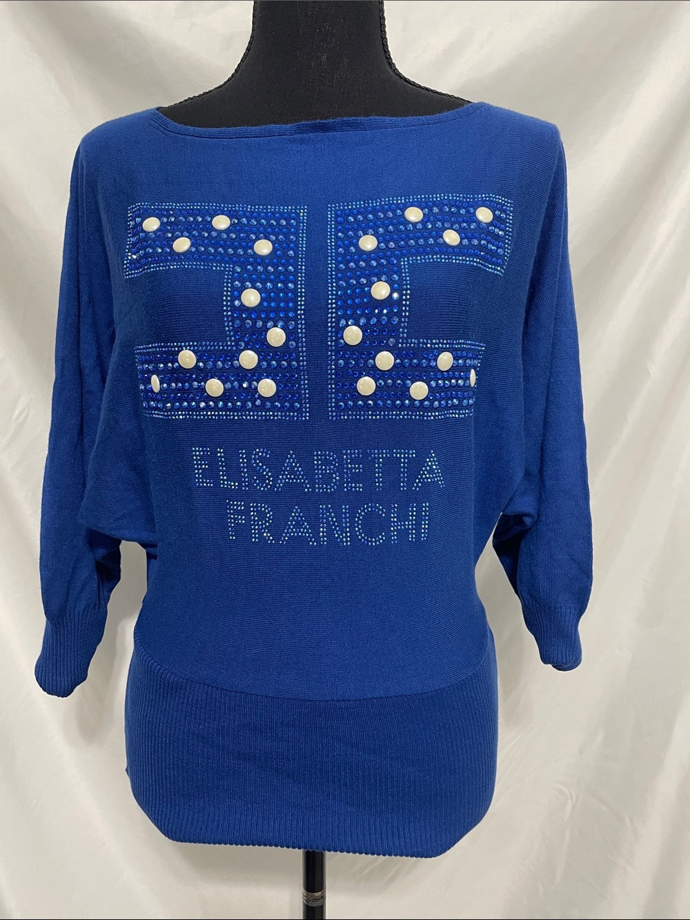 Elisabetta Franchi sax blue knitted top. Italy. Rhinestone logo. New. NWT.